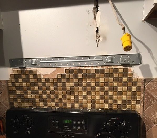 How to install an over-the-range microwave.