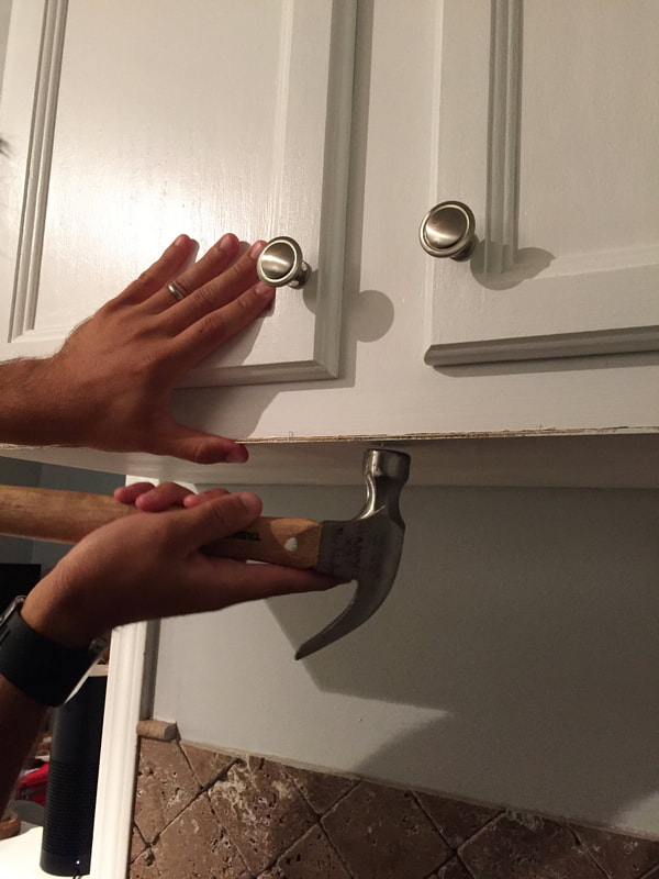 How to easily cover kitchen cabinet bottoms with cheap plywood.